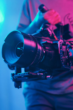 Professional_Video_Camera_In_Neon_Set_original_2511616-1024x683 1